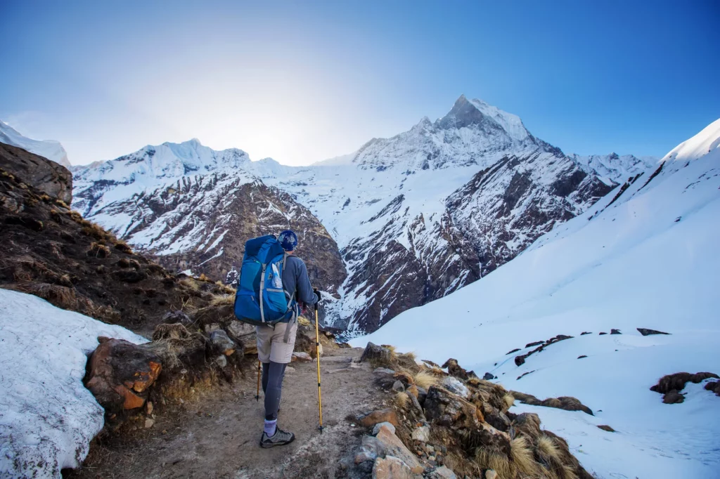 Himalaya hike Hiker on the trek in Himalayas, Anapurna valley, Nepal